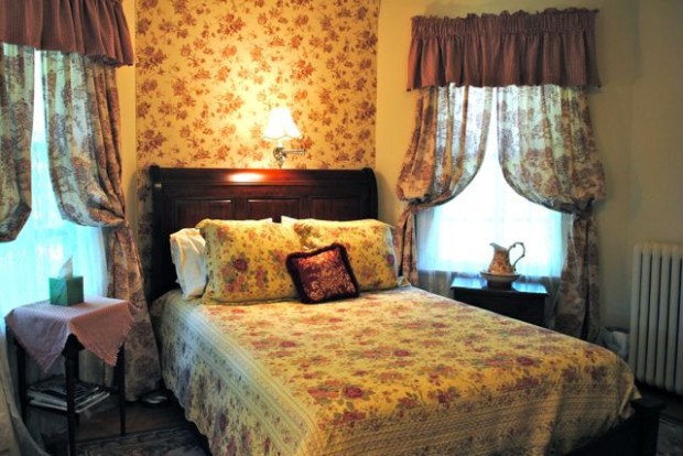 Rose room bed Tree Inn on Poplar Hill bed and breakfast